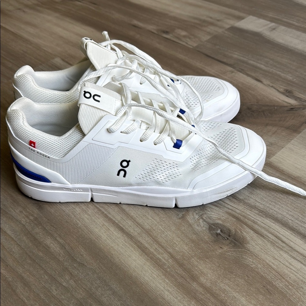 On Running White and Blue Sneakers with CloudTec Cushioning